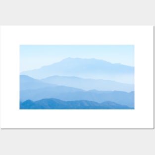 Blue ridge mountain, tiers of mountain ridges stretching into distance under blue sky Posters and Art